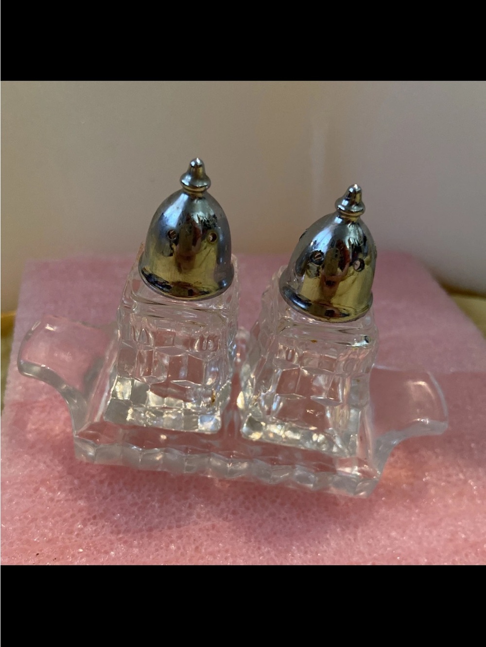 Vintage 1945 mini Fostoria S/P shakers with glass tray 2 1/4 “Tall  
3-piece set
